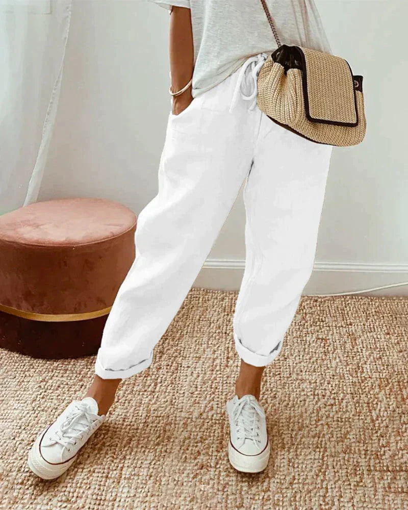 Stilvolle weiße Leinenhose für Damen, ideal für den Sommer. Bequeme weite Leinenhose in Weiß und Beige, perfekt für einen lässigen Look. Schwarze Leinenhose für Damen, die Eleganz und Komfort vereint.