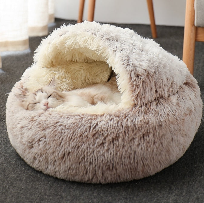 Eine gemütliche Katzenhöhle, die als komfortables Katzenbett dient. Die Kuschelhöhle bietet den perfekten Rückzugsort für Ihre Katze und ist zugleich ein stilvolles Katzen Bett für Ihr Zuhause. Liebevoll gestaltete Katzenhöhle für das ultimative Wohlfühlerlebnis Ihrer Katze